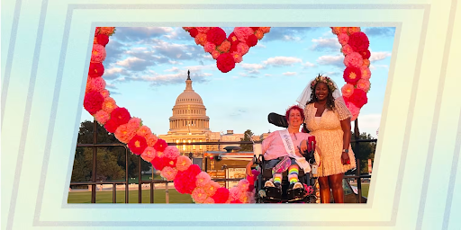 Photo: Ayesha Elaine Lewis, a staff attorney at the Disability Rights Education & Defense Fund, participated in a mass commitment ceremony to protest restrictions on disabled people marrying.  Couple is pictured in front of the Capital, a large heart made of balloons on around them.