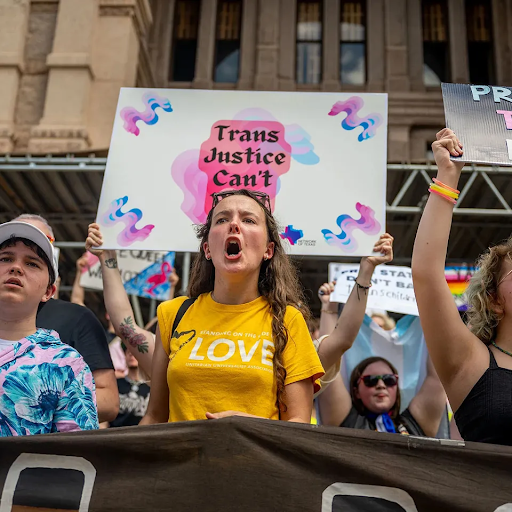 People protest in front of the Texas State Capitol during a Queer March demonstration on April 15, 2023 in Austin, Texas.