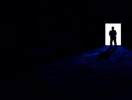 Graphic/artwork of the darkened silhouette of a person standing in a brightly lit doorway, the rest of the visual in pitch blackness. 